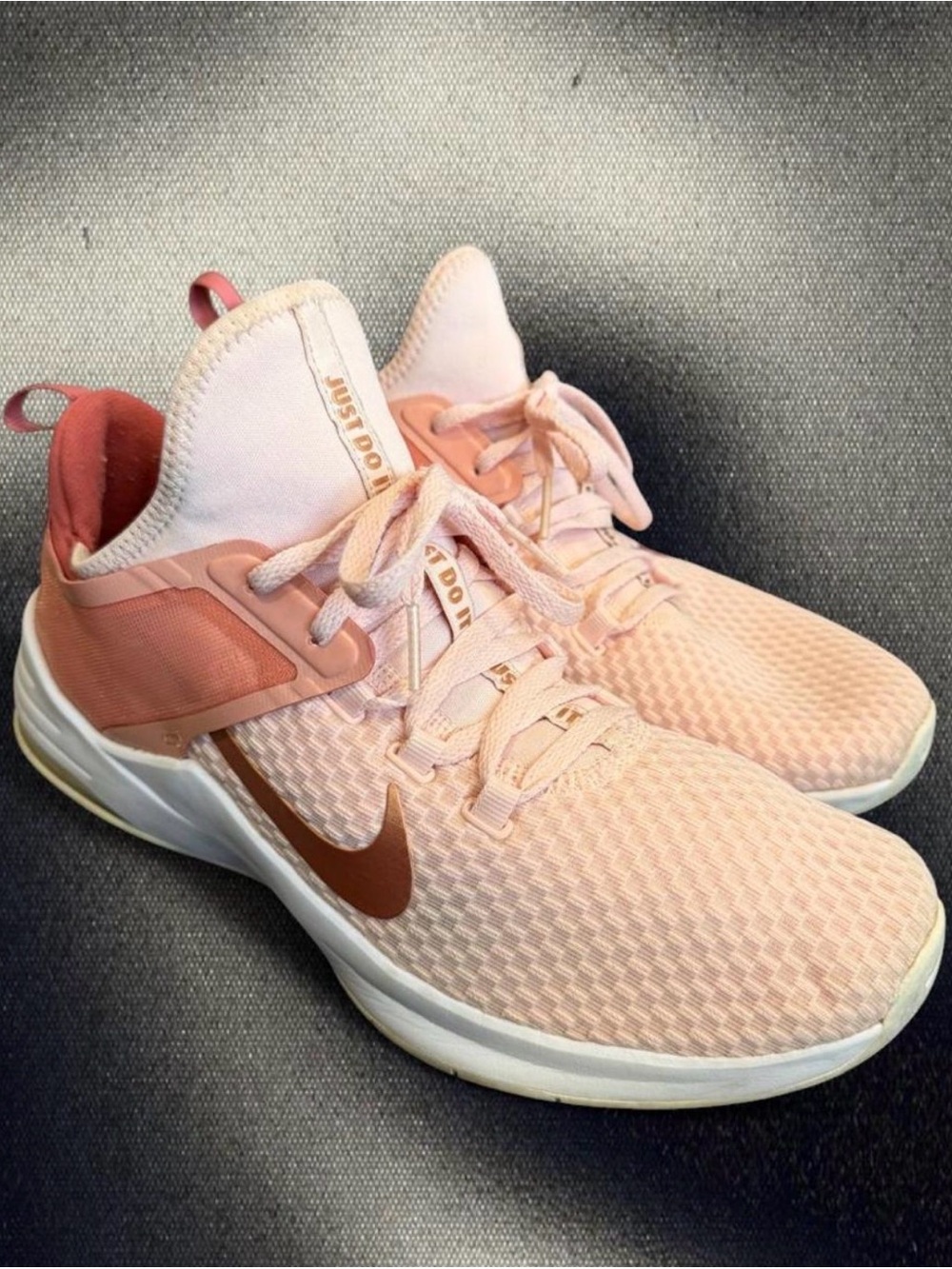 Nike Women's Light Pink Athletic Sneakers with Copper Swoosh